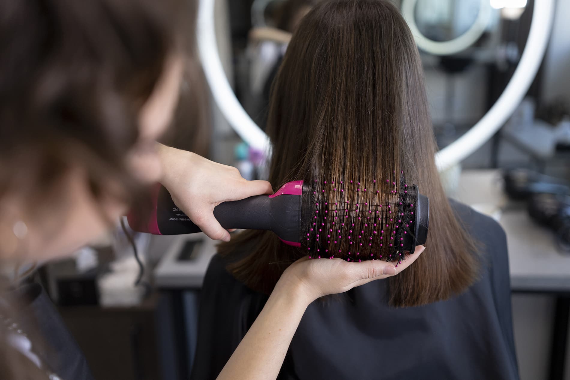 hairdresser-taking-care-of-her-client (1) (1)