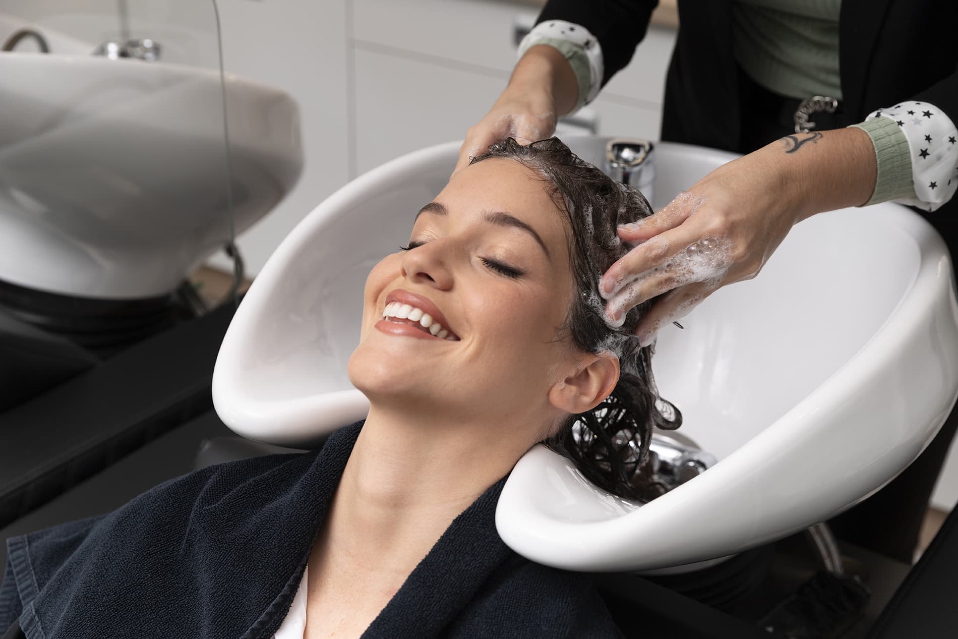 woman-getting-treatment-at-hairdresser-shop (2) (1)